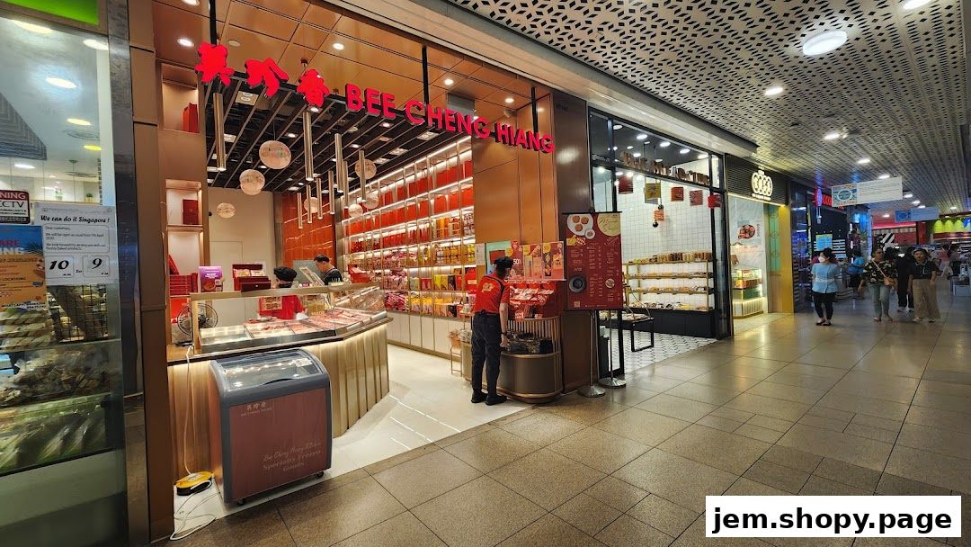 Bee Cheng Hiang shop front displaying various food products and a menu board.