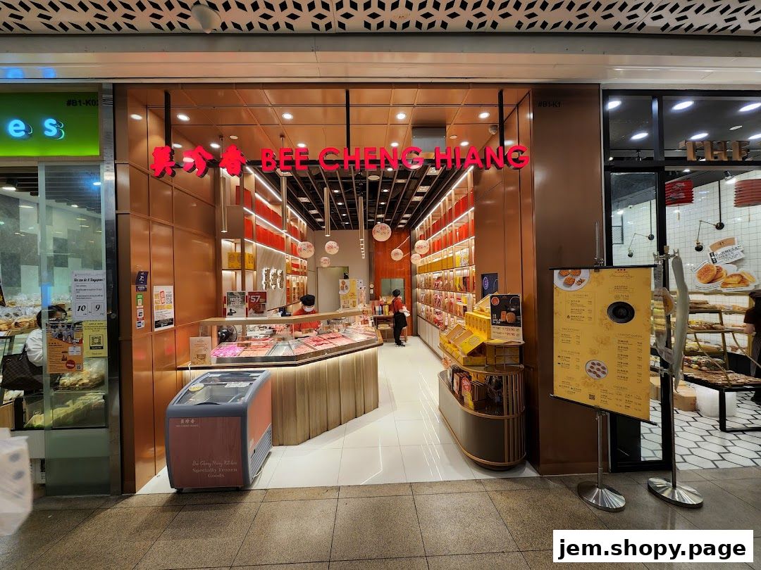 Bee Cheng Hiang shop front with displays of meat products and a promotional sign.