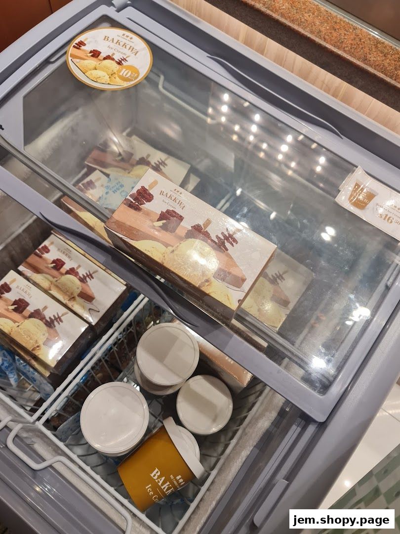 Freezer display of Bak Kwa ice cream boxes and tubs from Bee Cheng Hiang.