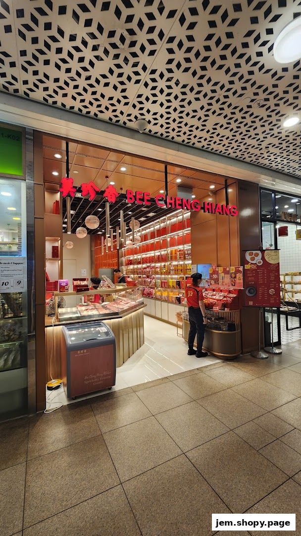 Bee Cheng Hiang shop front displaying various meat products and snacks.
