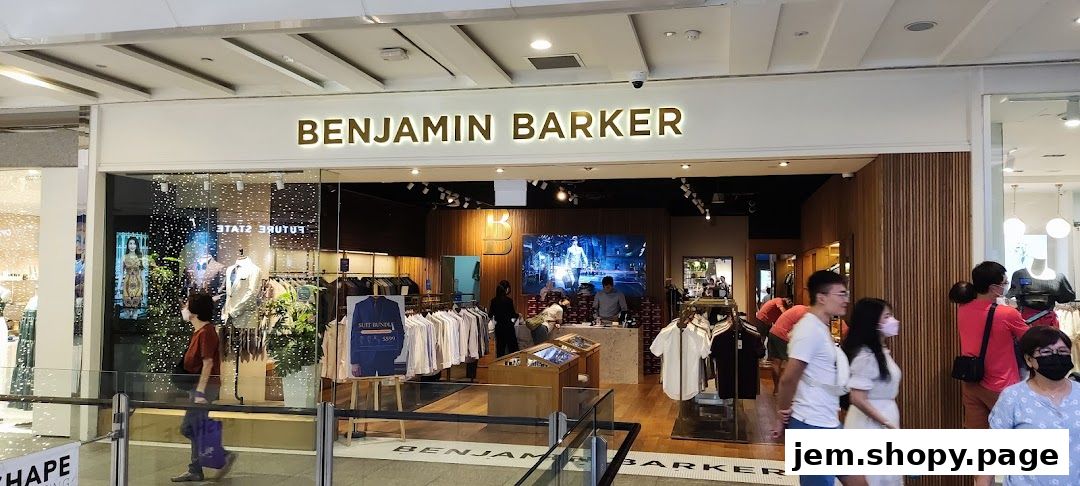 Benjamin Barker store entrance with clothing displays and shoppers.