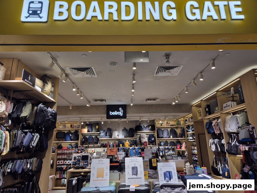 Interior view of a luggage and bag store named Boarding Gate, showcasing various travel bags.
