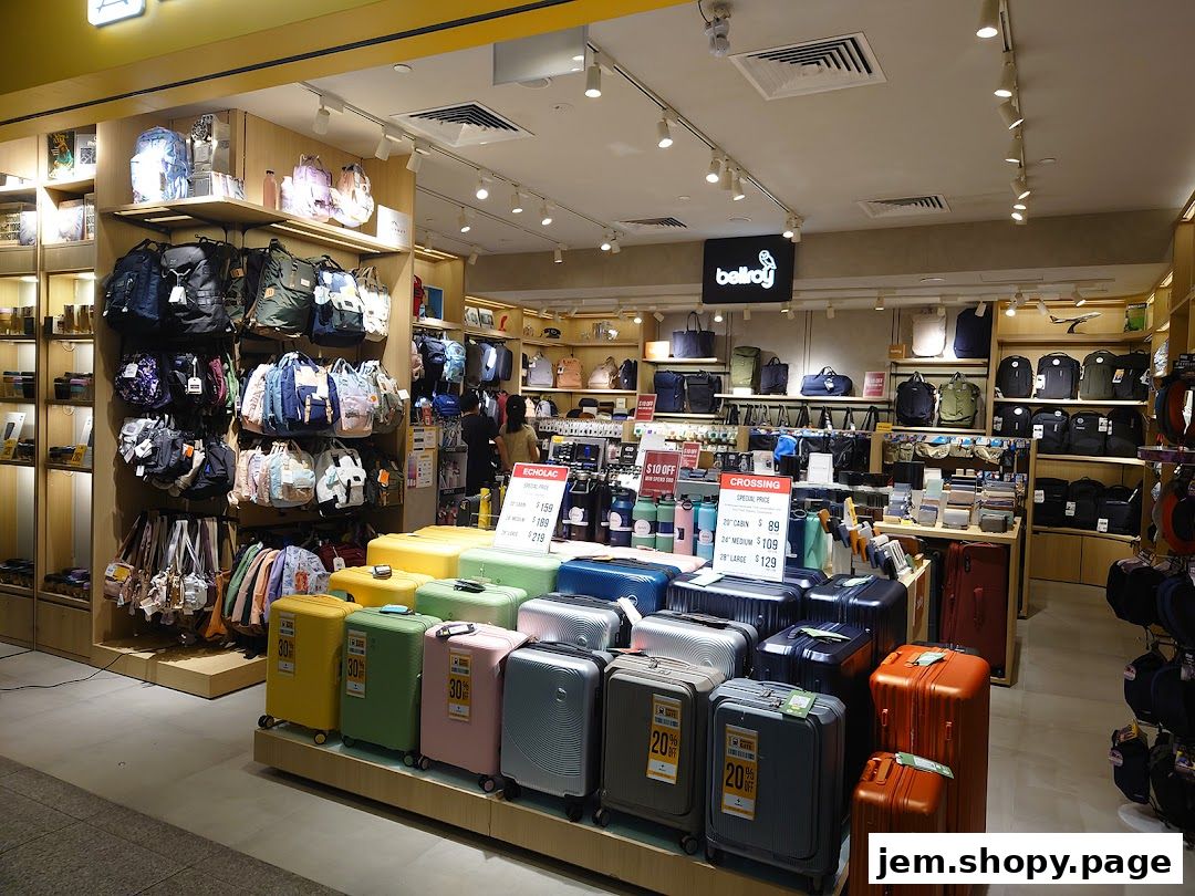 Interior view of a retail store selling backpacks, luggage, and travel accessories.