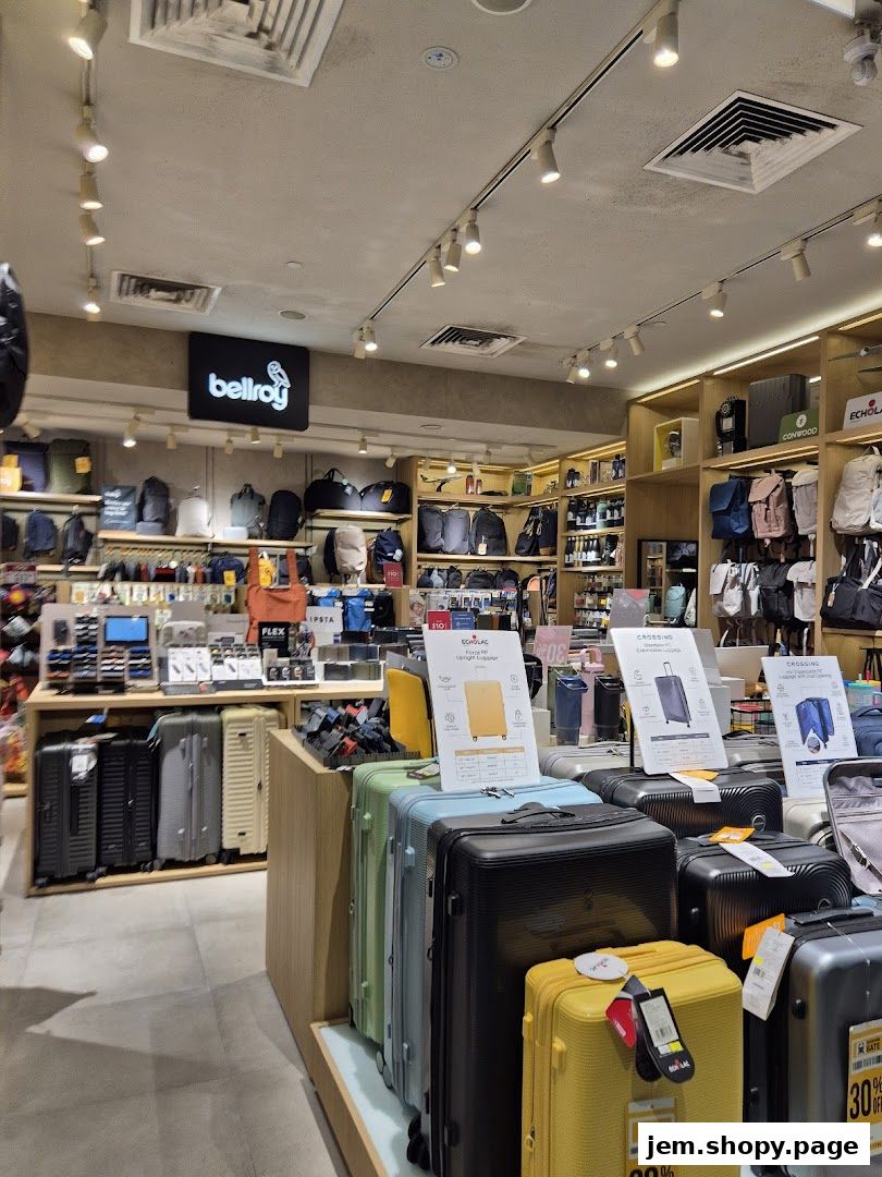 Interior view of a luggage and bag store showcasing various travel bags and suitcases.