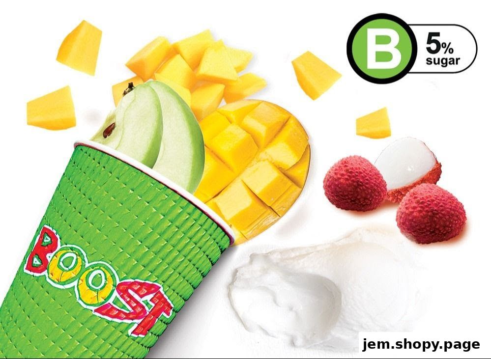 A green Boost Juice cup with mango, apple, lychee, and cream.
