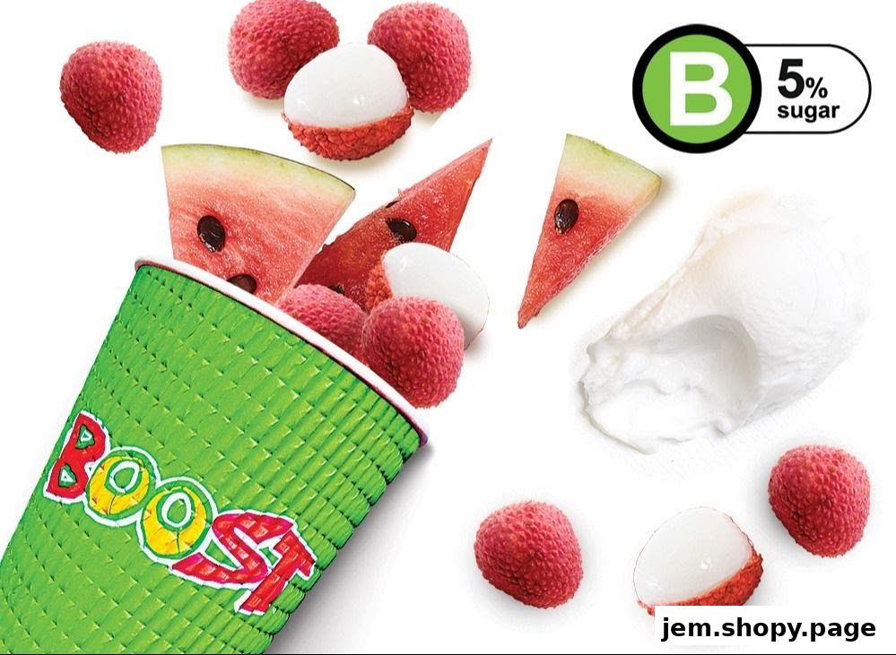 A Boost Juice cup overflowing with lychees and watermelon slices, with a dollop of cream.