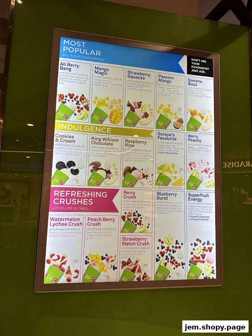 A menu board displaying popular and refreshing juice and smoothie options from Boost Juice.