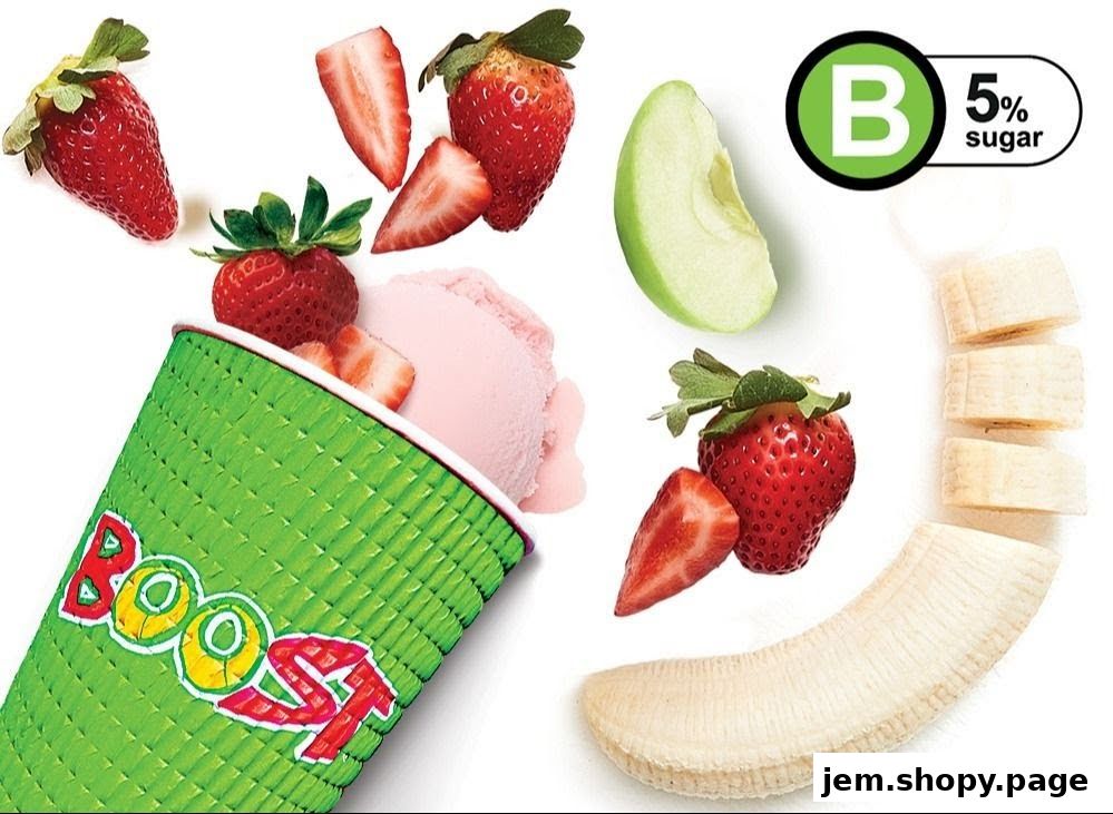 A Boost Juice cup with strawberries, apple, banana, and pink ice cream.