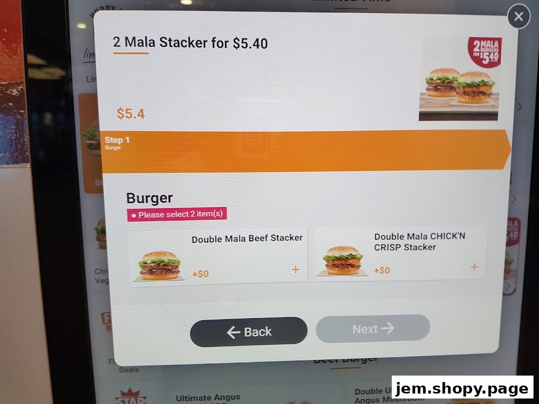 A digital menu screen showing Burger King's '2 Mala Stacker' deal with burger options.