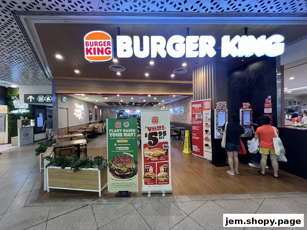 Burger King storefront with prominent signage, menu displays, and ordering kiosks.