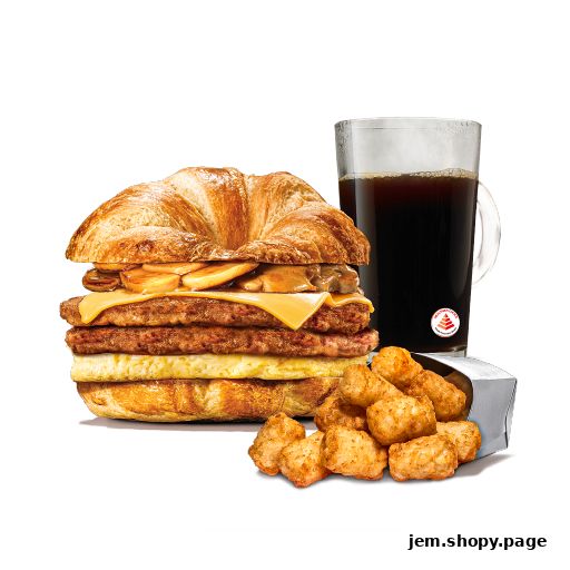 A delicious breakfast sandwich with coffee and tater tots.