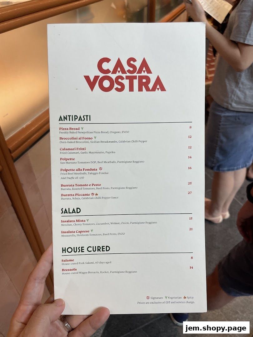 A menu from Casa Vostra featuring antipasti, salads, and house-cured items.