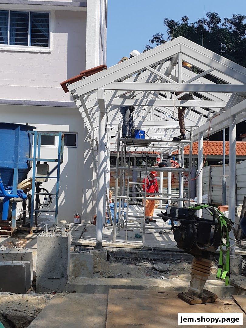 Construction workers building a new structure with scaffolding and materials.