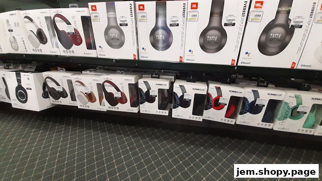 Shelves stocked with various brands and colors of boxed headphones.