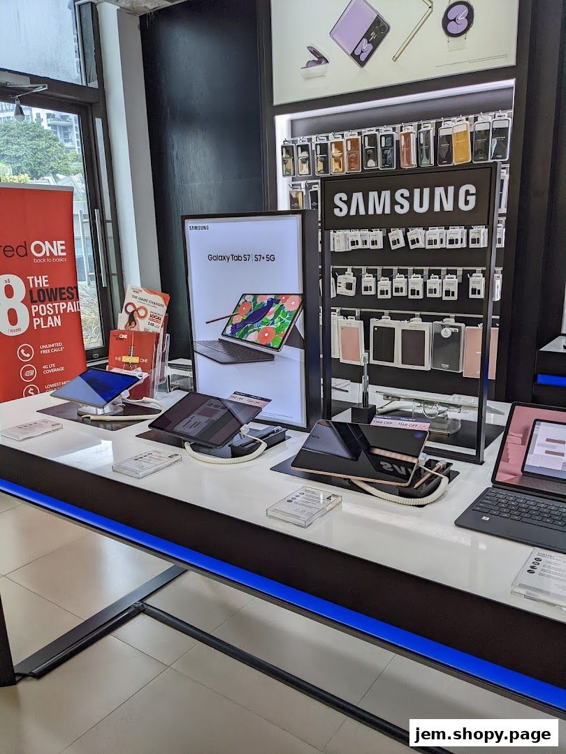 Samsung products and accessories displayed on a retail store counter.