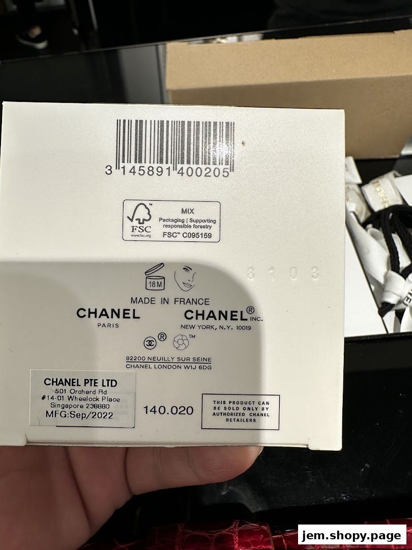 Close-up of Chanel product packaging with manufacturing and distribution details.