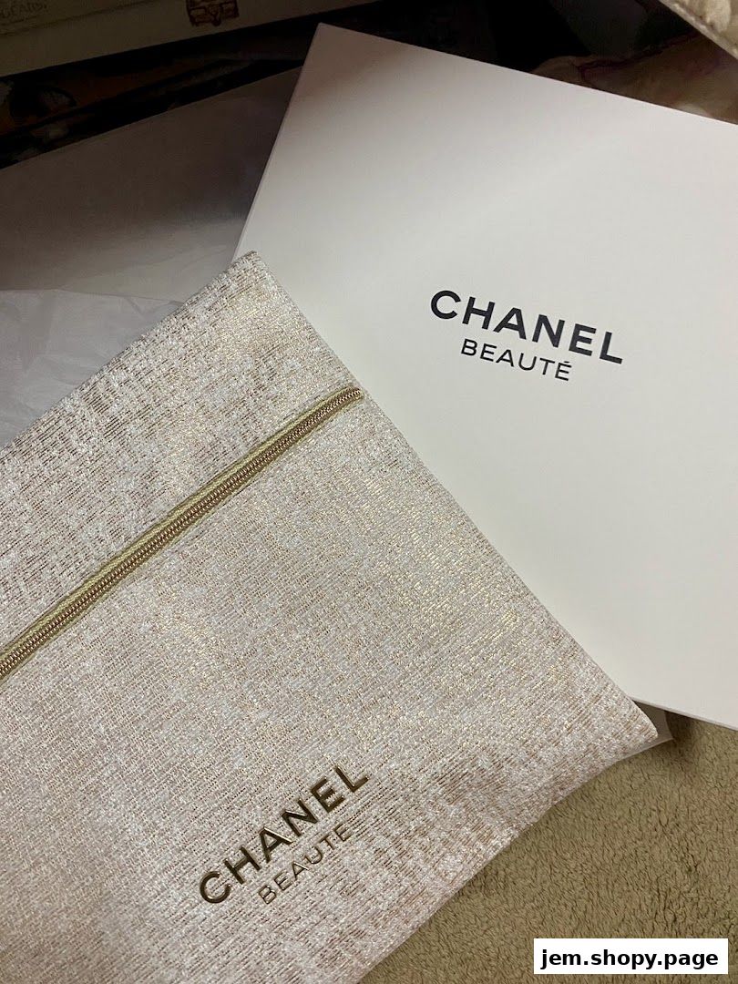 Chanel beauty pouch and gift box with gold accents.