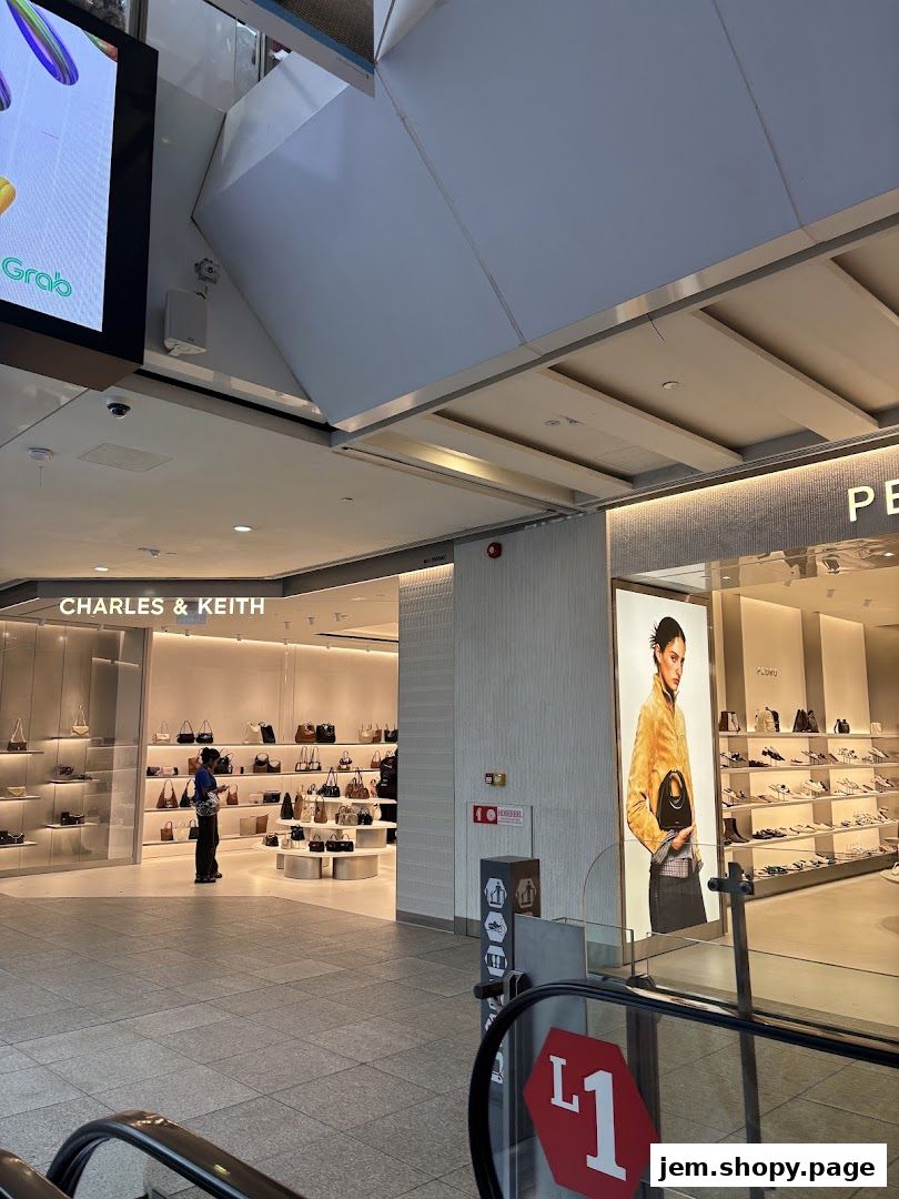 The entrance to Charles & Keith shoe and handbag store, showcasing stylish displays.