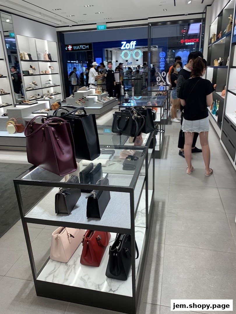 Interior view of a Charles & Keith store showcasing handbags and shoes on display.