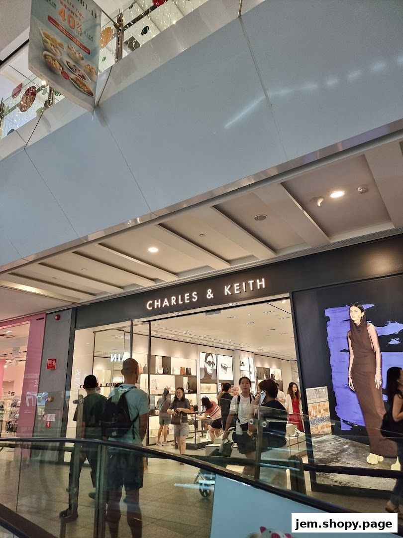 The CHARLES & KEITH store entrance with shoppers browsing inside.