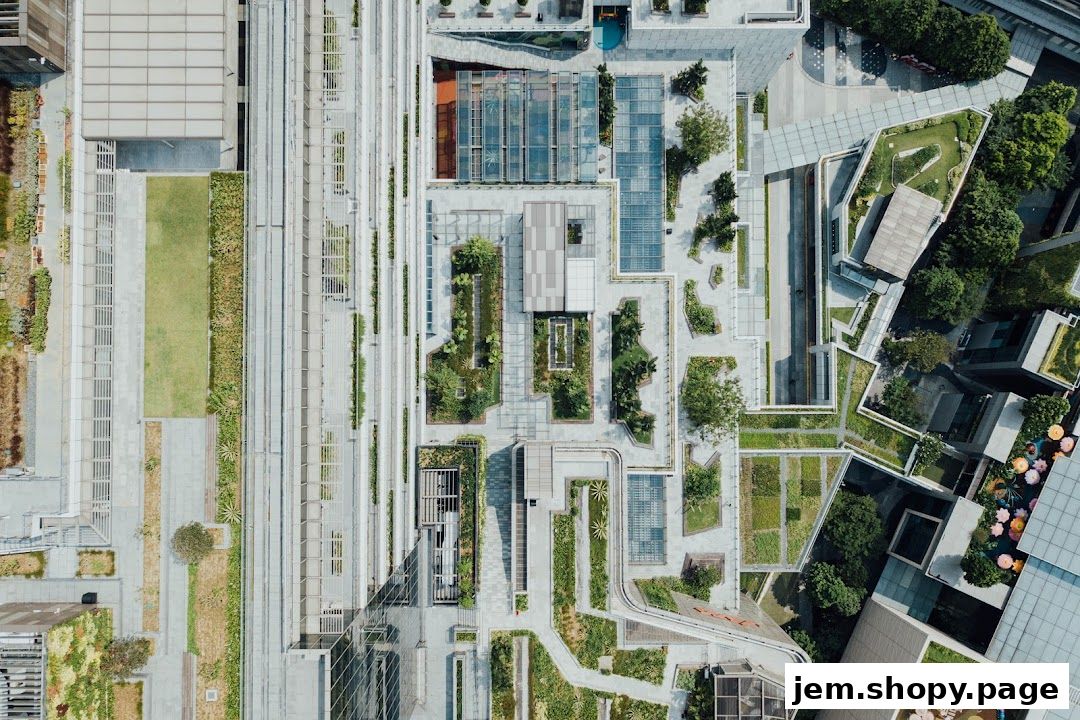 Aerial view of a modern shopping mall with green spaces and architectural elements.