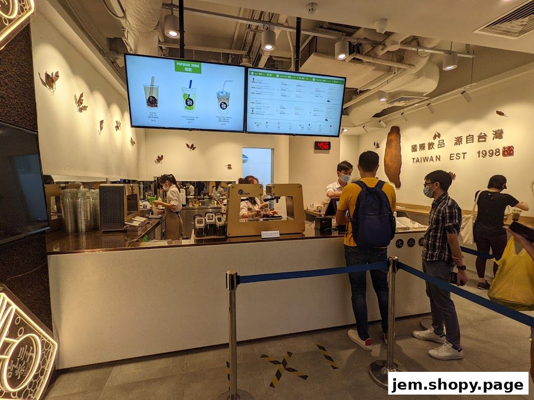 Customers queue at CHICHA San Chen for popular bubble tea drinks.