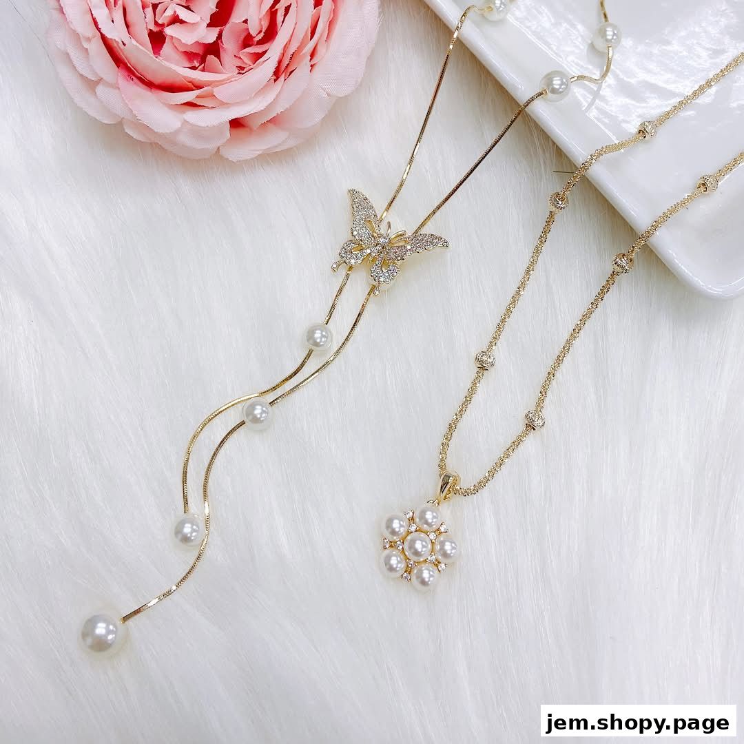 Elegant gold necklaces with pearl and crystal embellishments, including a butterfly and floral design.
