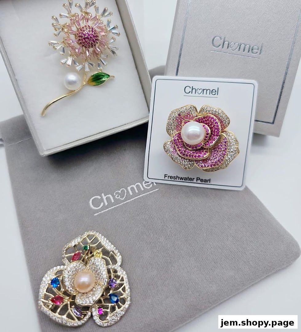 A display of elegant floral-themed brooches from Chomel, featuring pearls and colorful gemstones.