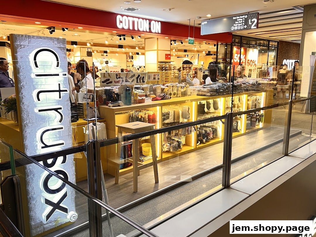 A retail shop called Citrusox with a bright yellow display and various products.
