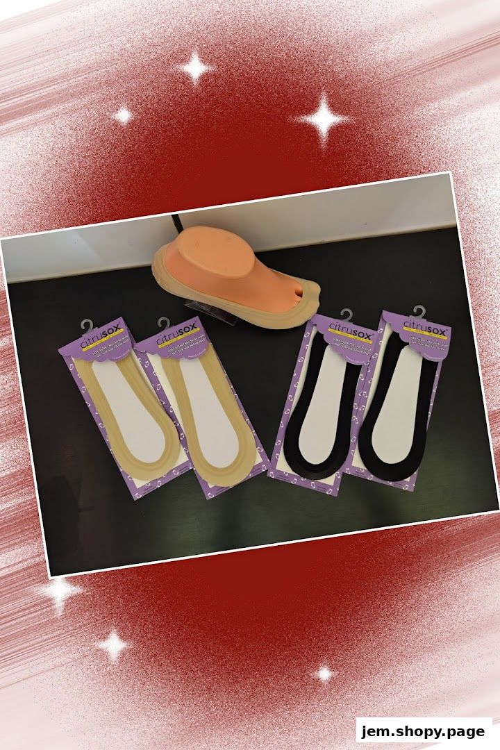 Citrusox no-show socks displayed with a foot mannequin on a dark surface.