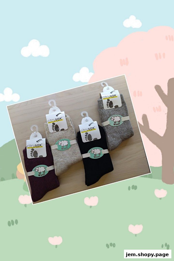 Four pairs of wool socks from Citrusox in various colors, displayed with branding.