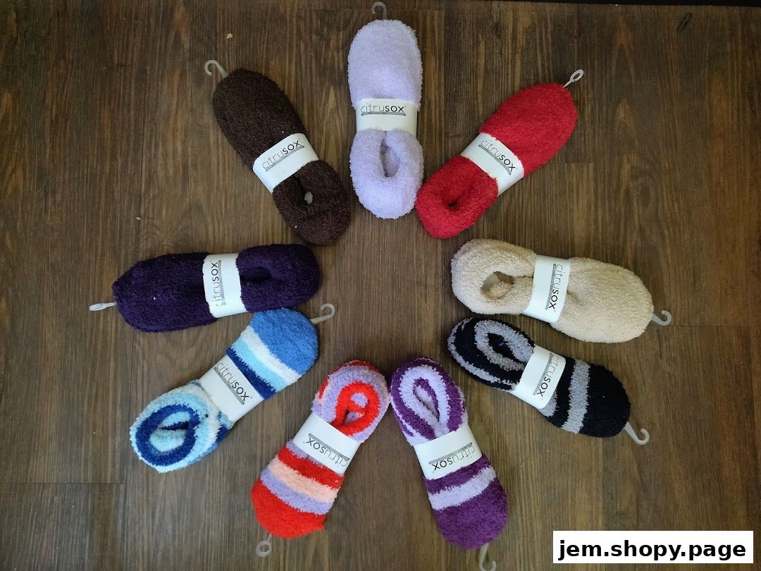A collection of colorful, fluffy socks arranged in a circle on a wooden surface.