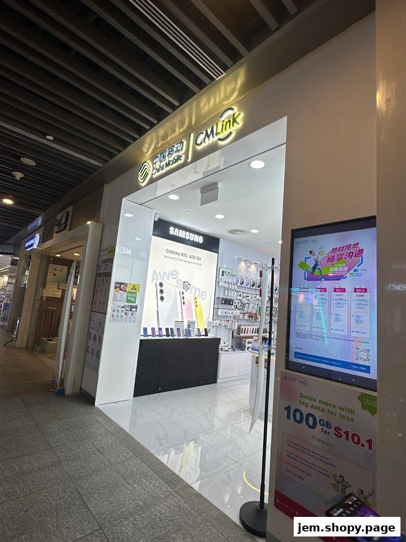 The CMLink Singapore Service Centre at JEM showcases Samsung phones and mobile plans.