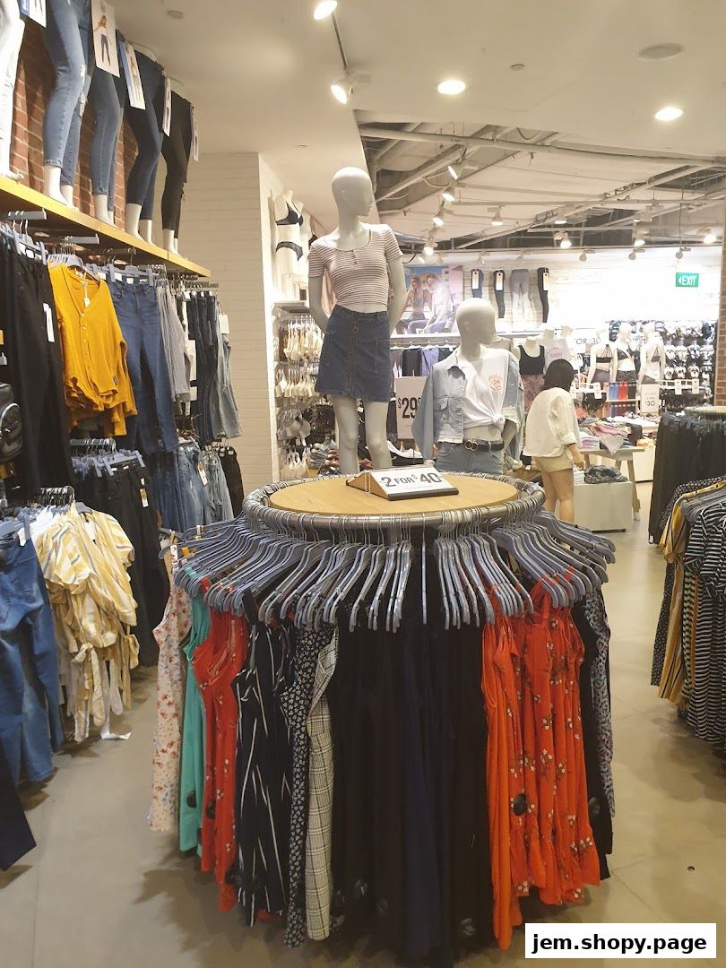Interior view of a Cotton On store showcasing clothing on racks and mannequins.