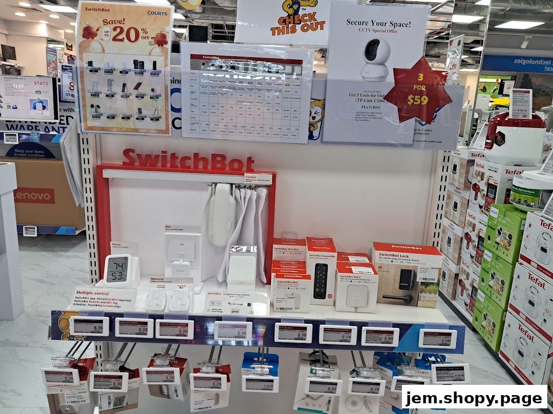 A display of SwitchBot smart home devices and other electronics at COURTS JEM.
