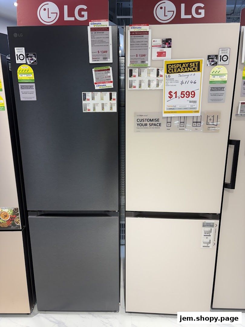 Two LG refrigerators, one black and one cream, are displayed side-by-side with price tags.