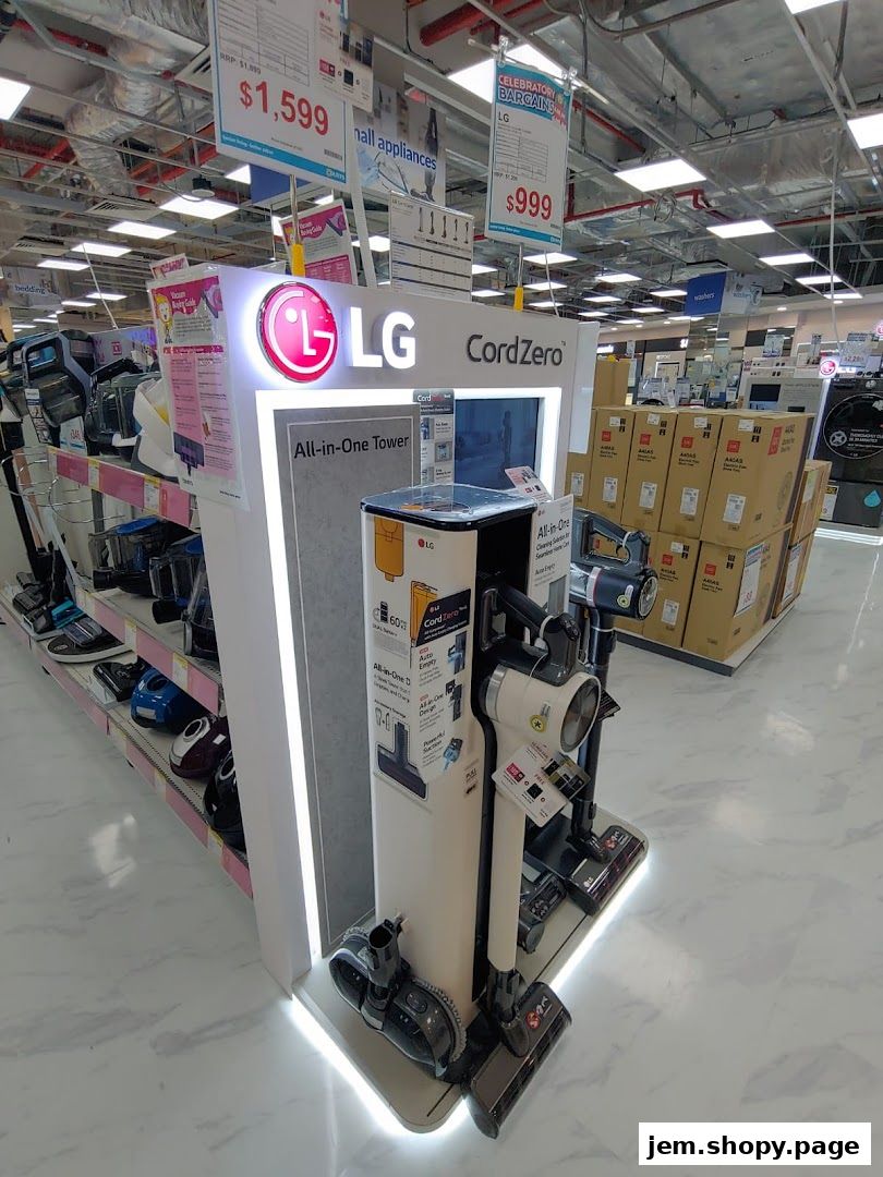 LG CordZero vacuum cleaners displayed with pricing and promotional signs in a retail store.