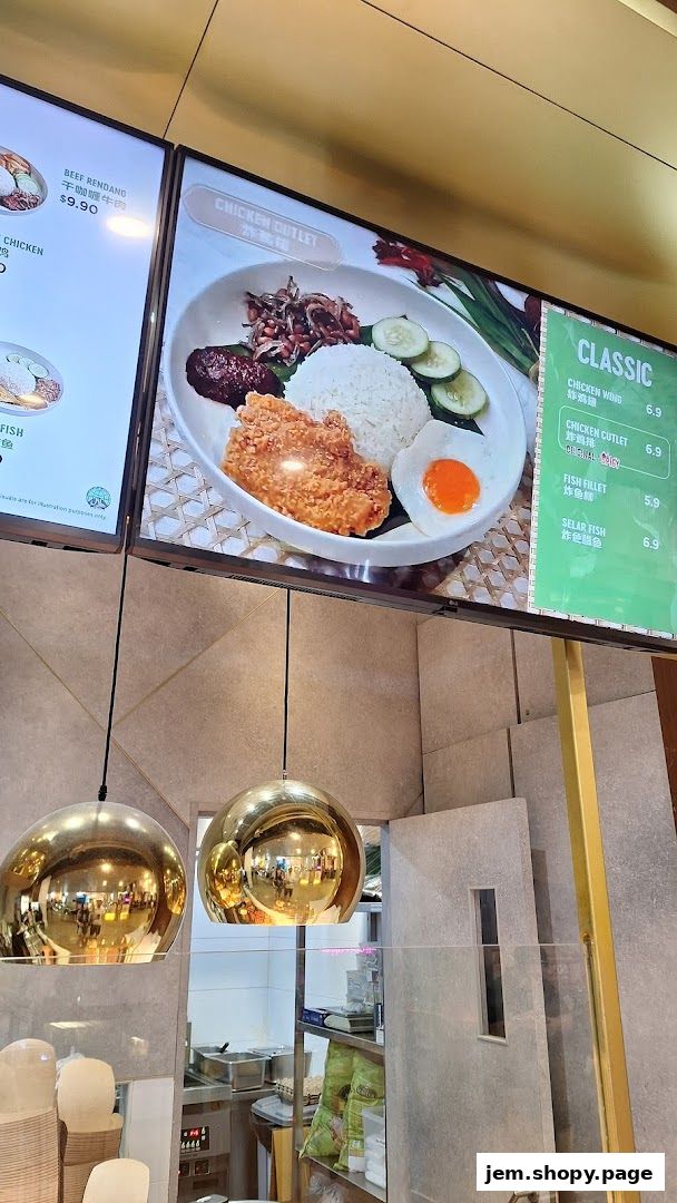 A digital menu board displaying Nasi Lemak dishes with prices.