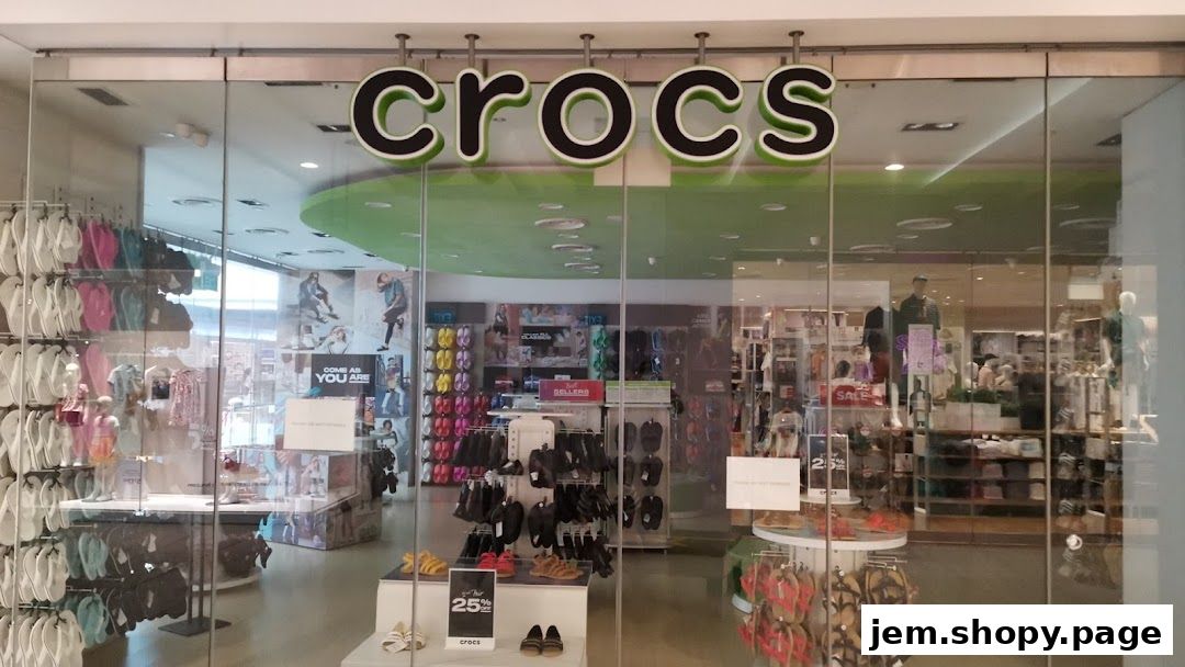 The Crocs store entrance displays a wide variety of colorful footwear and apparel.
