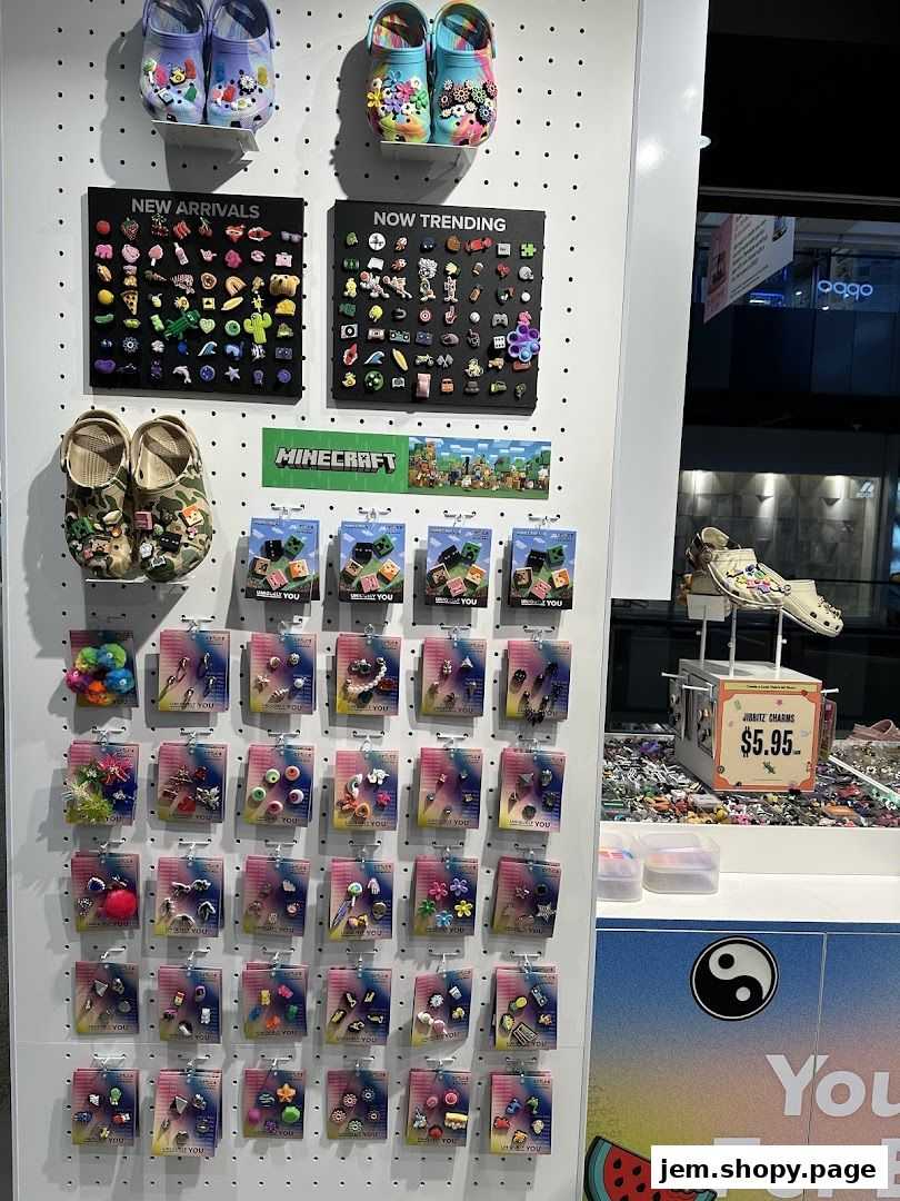 Display of Crocs shoes and a wide variety of Jibbitz charms for customization.
