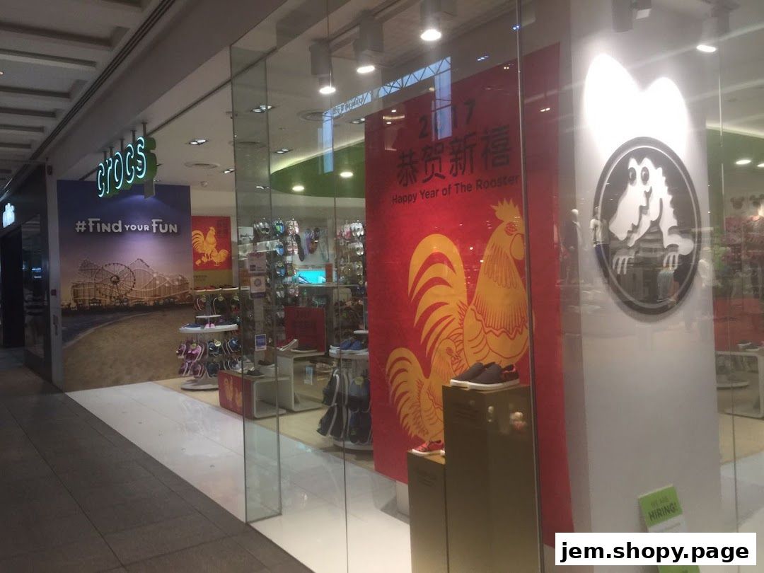 Crocs store front with "Happy Year of the Rooster" display and various footwear.