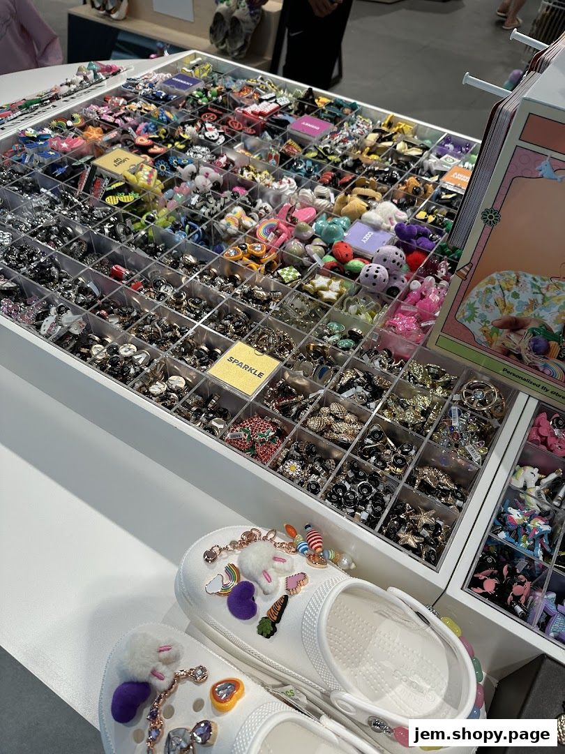 A display of colorful Jibbitz charms and decorated Crocs shoes.