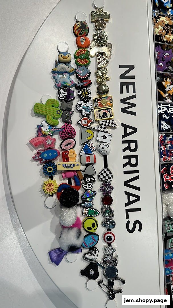 A display of colorful and novelty Jibbitz charms for Crocs shoes.
