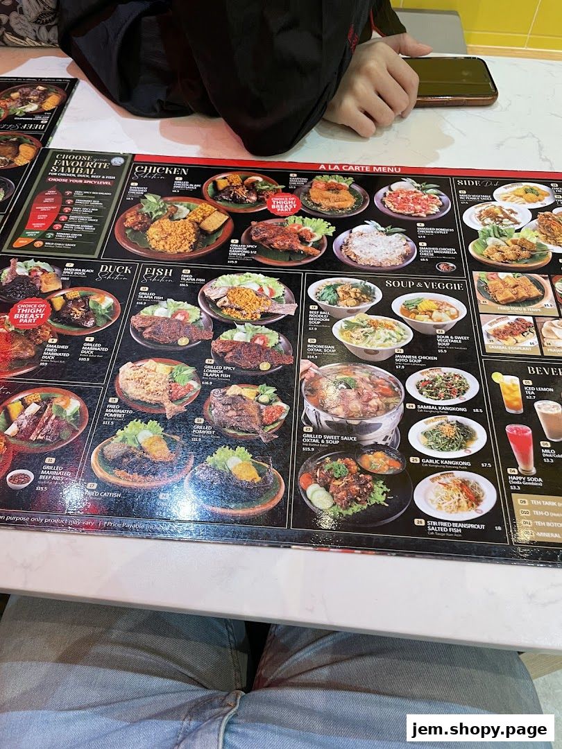 A menu from DPenyetz Jem featuring various chicken, duck, fish, soup, and vegetable dishes.