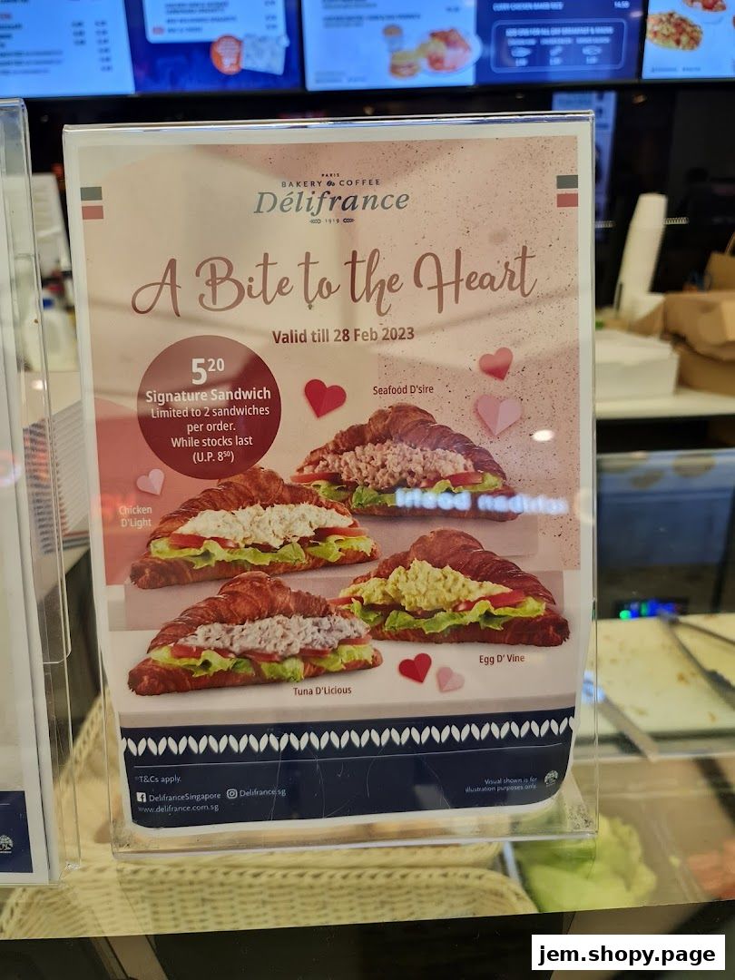 A promotional poster for Délifrance featuring signature sandwiches and a Valentine's Day theme.