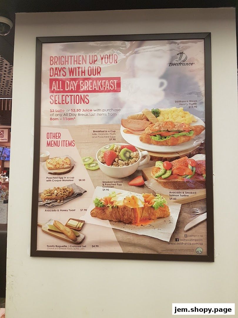 A menu board for Délifrance featuring all-day breakfast selections and other menu items.