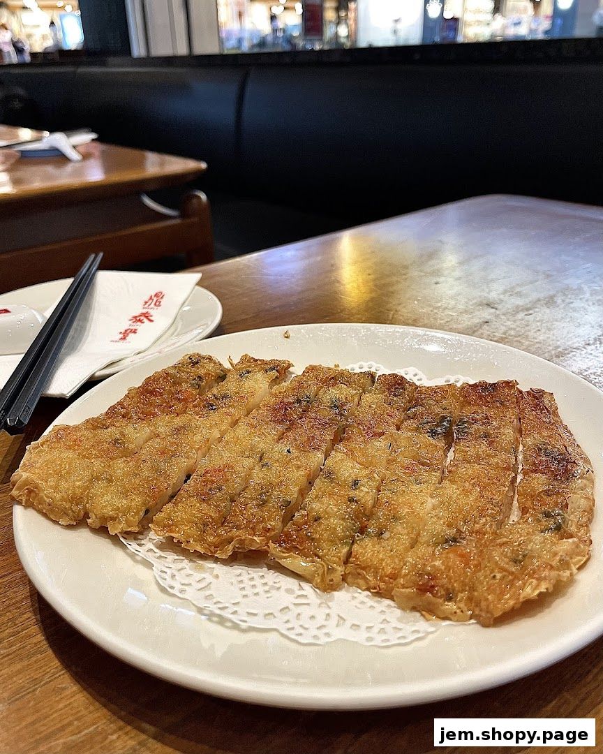 A plate of crispy fried tofu skin rolls served at Din Tai Fung.