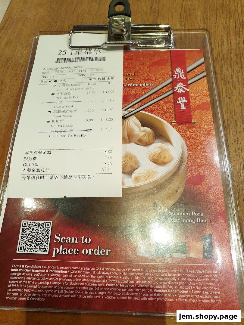A receipt from Din Tai Fung showing ordered items and prices, with a QR code for ordering.