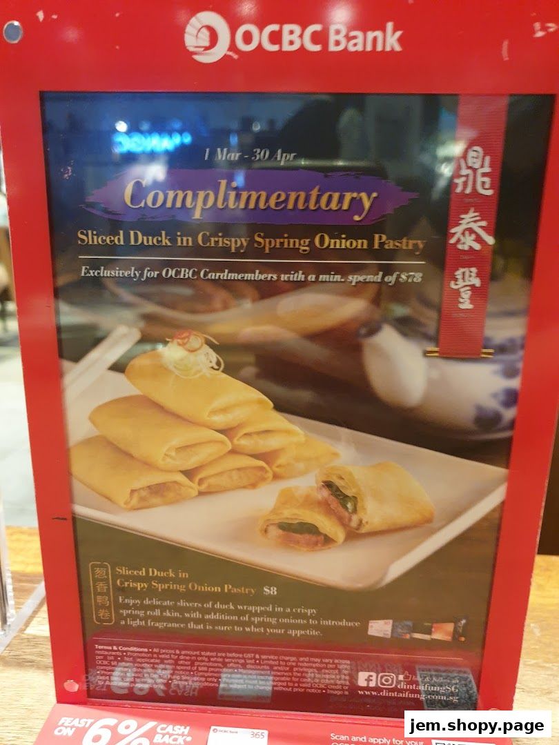A promotional flyer for Din Tai Fung offering complimentary sliced duck pastry.