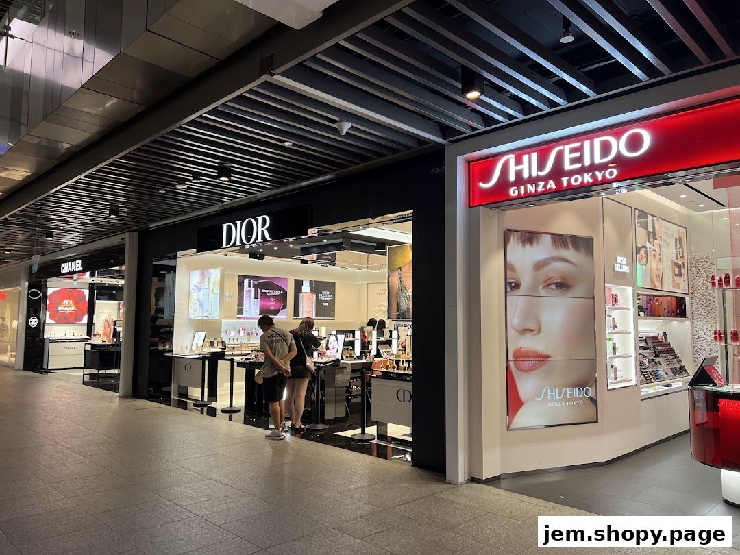 A view of the Dior Beauty and Shiseido beauty stores in a shopping mall.